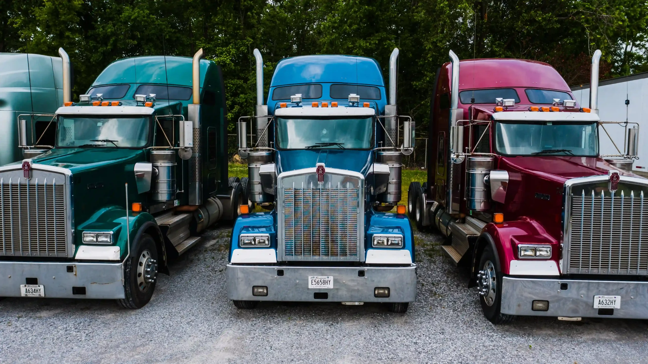 neatly lined up in a truck parking lot