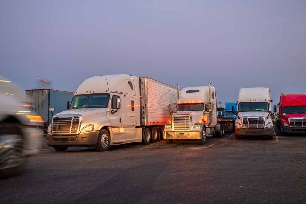 trucks at twilight in parking lot