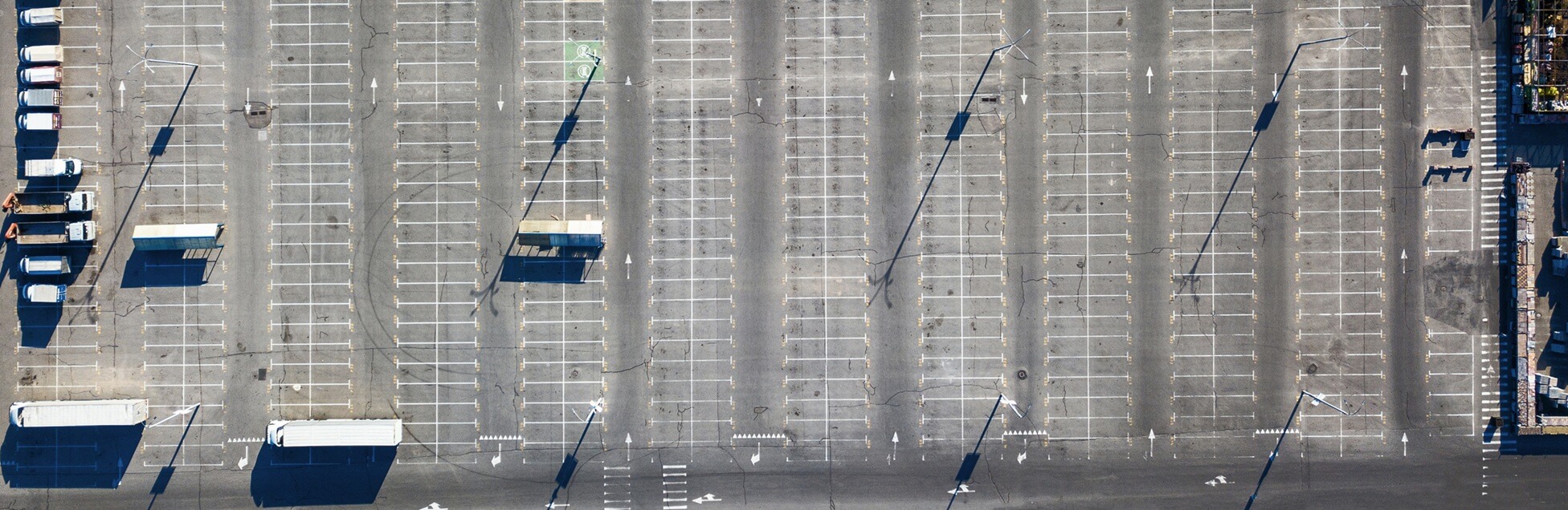 aerial view of parking with trucks