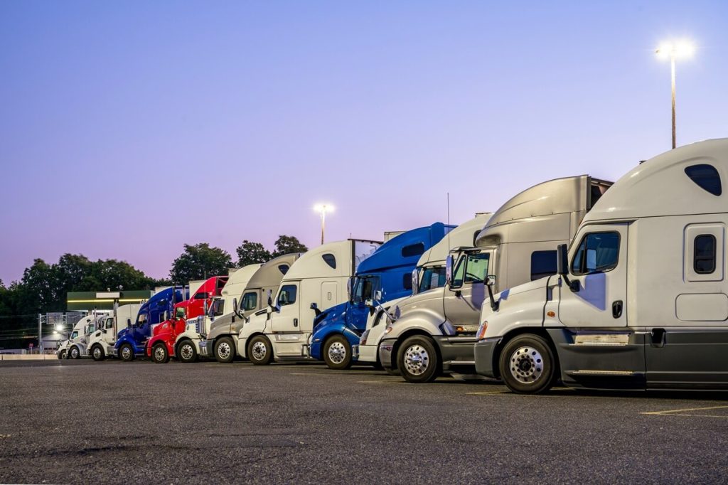 rigs at truck parking lot