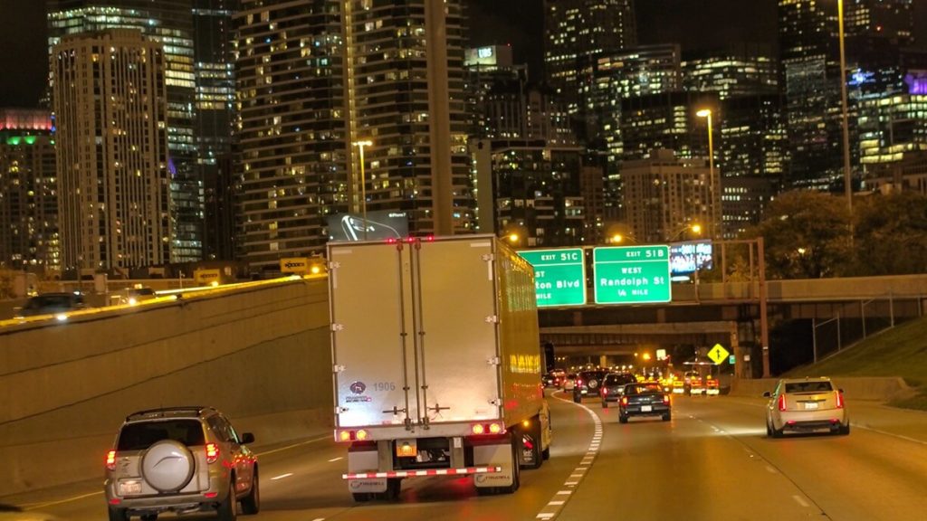 underpass at night on busy interstate highway
